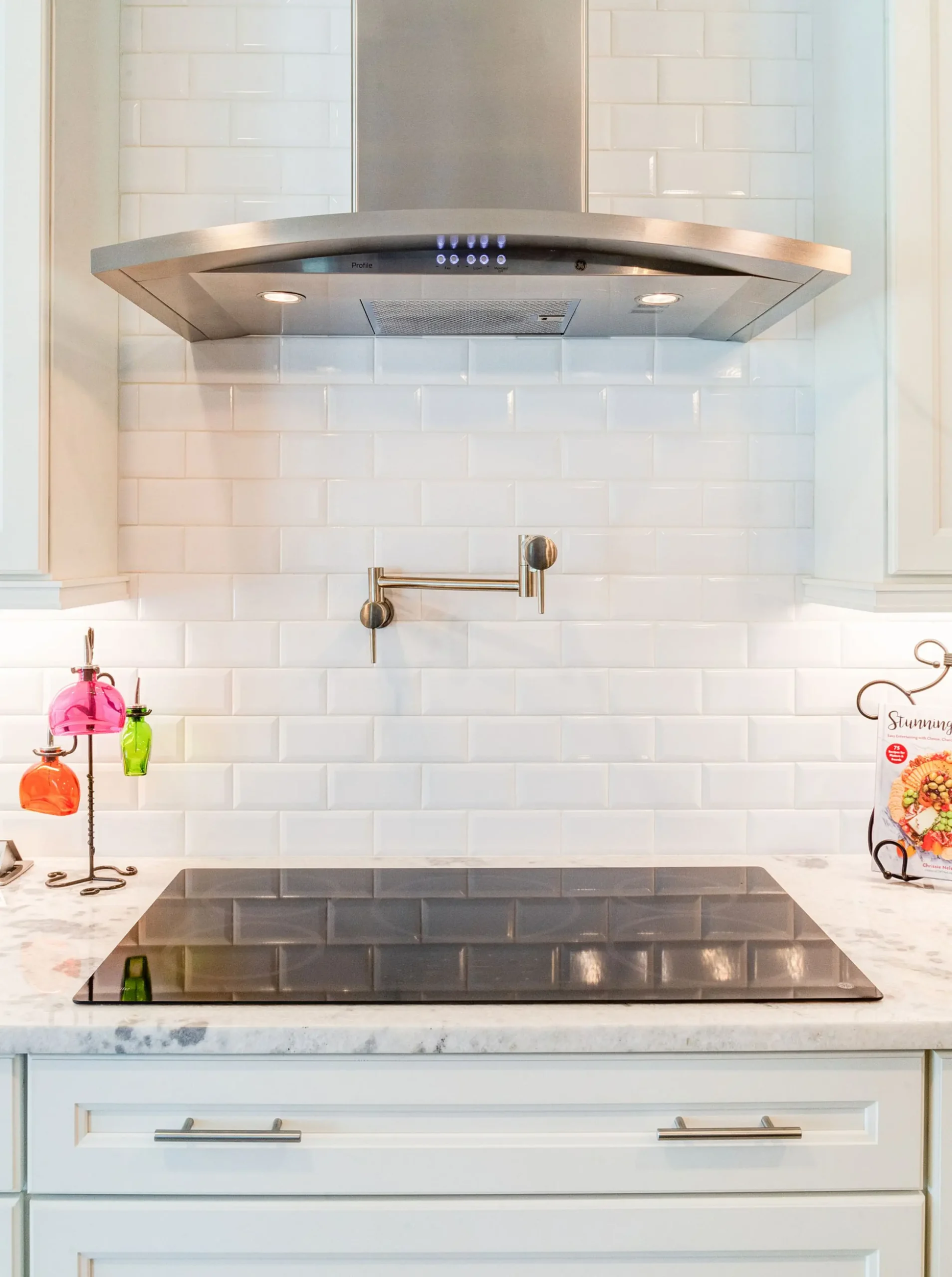 Remodeled kitchen in Sebring, FL with white subway tile and quartz countertops