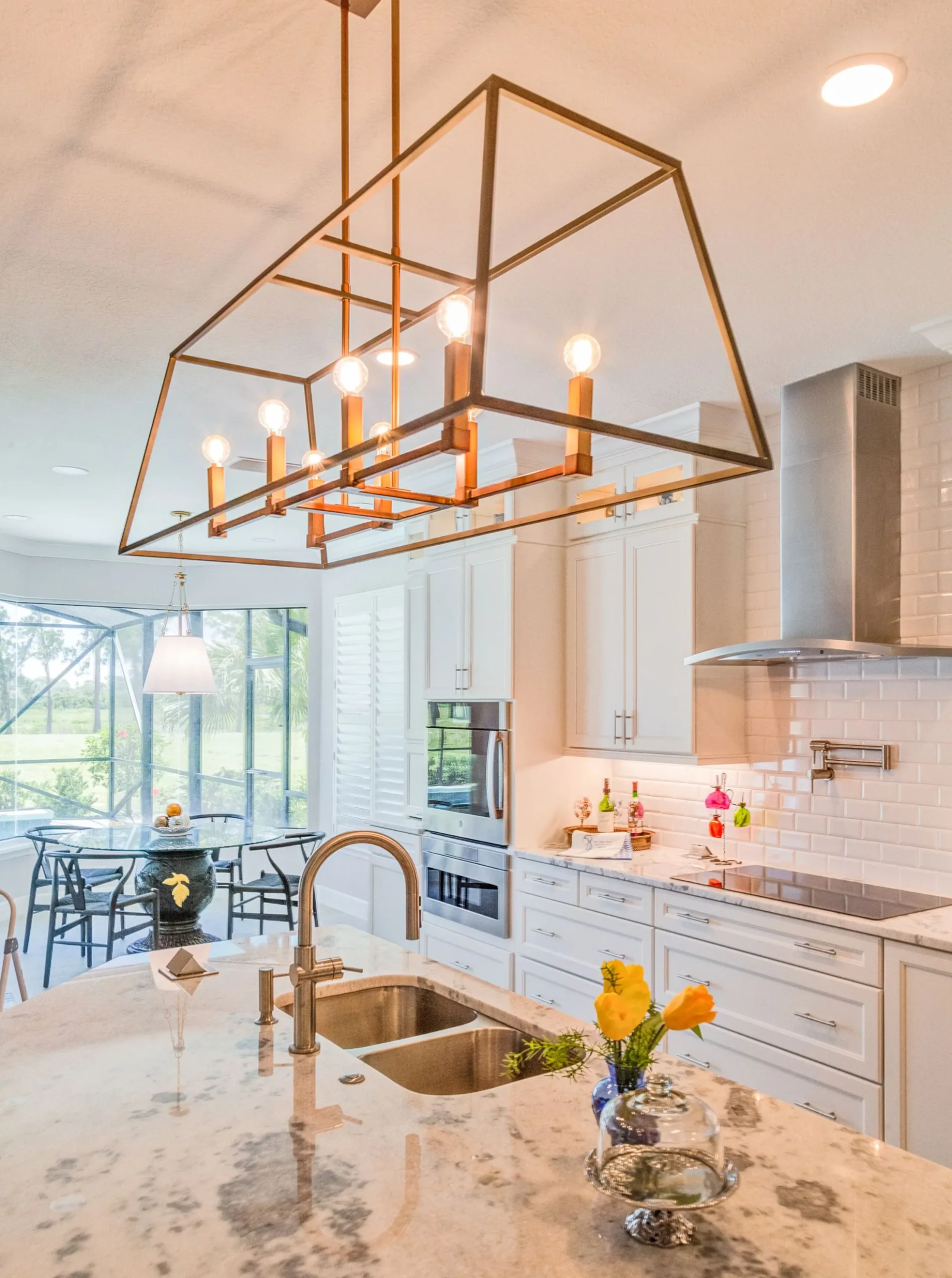 Large kitchen island with seating and pendant lighting during Sebring, FL kitchen remodel