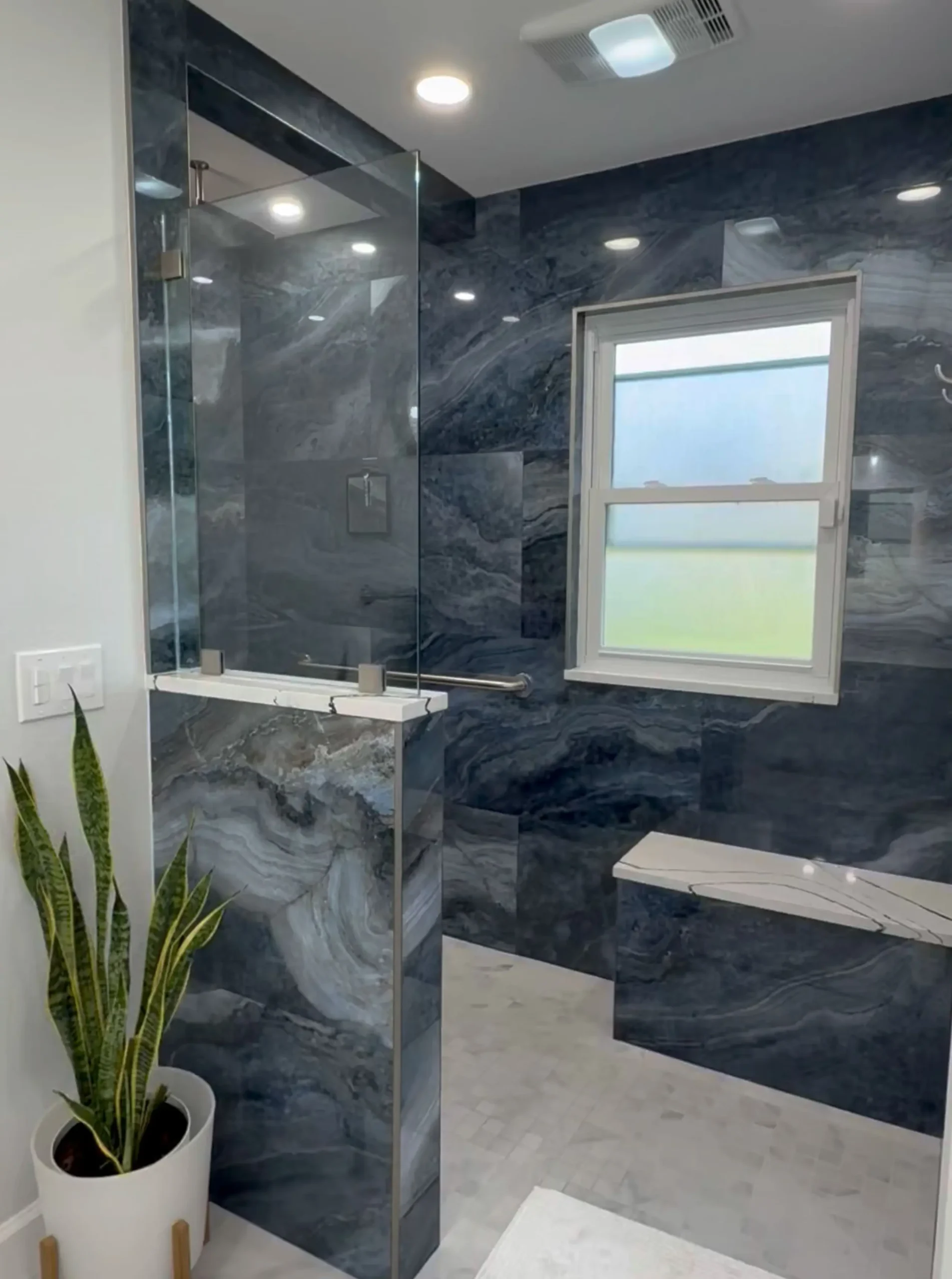 walk in shower with large blue tile format tile in Sebring, Florida