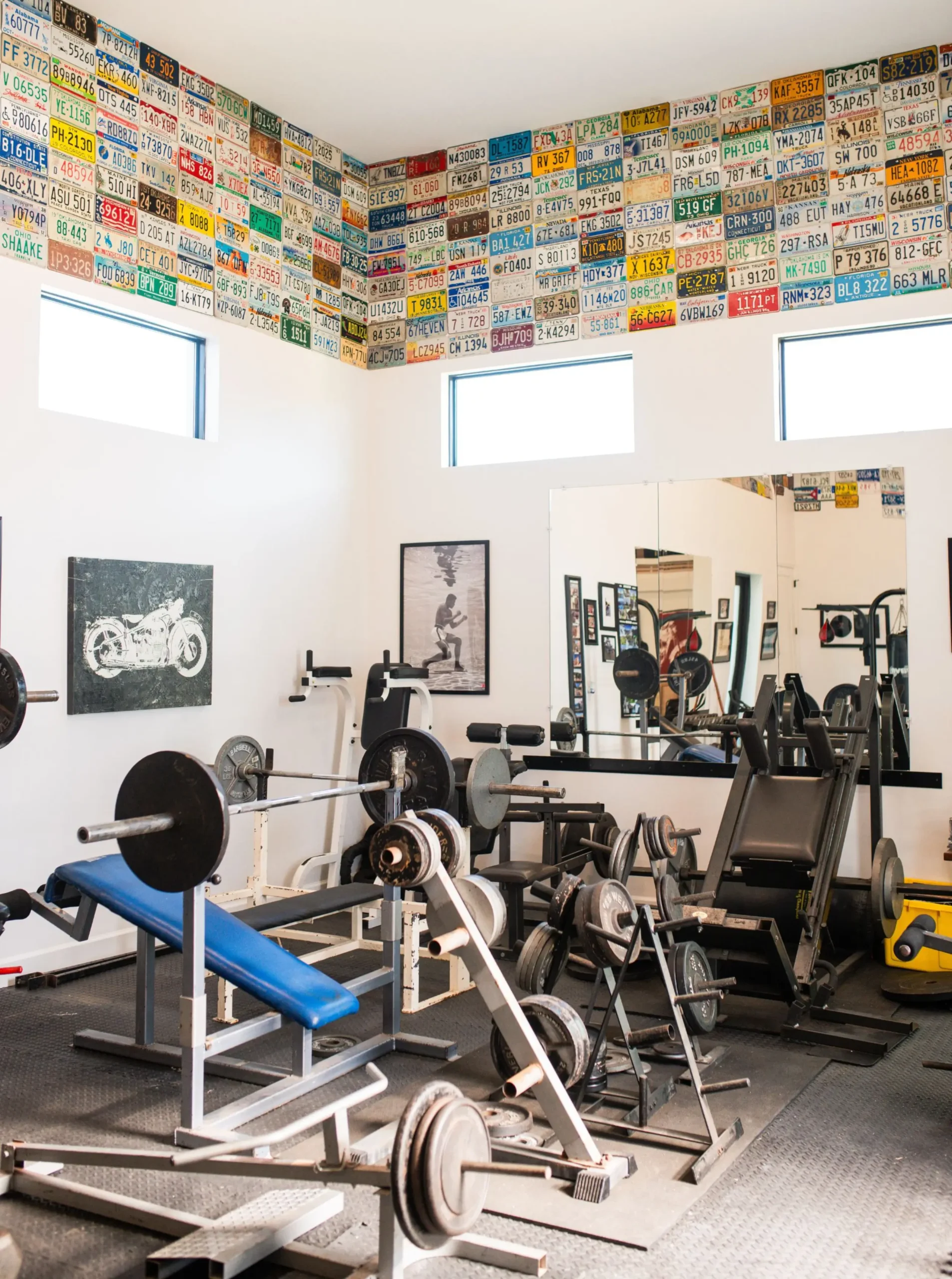 Flexible gym with workout gear inside the modern pool house