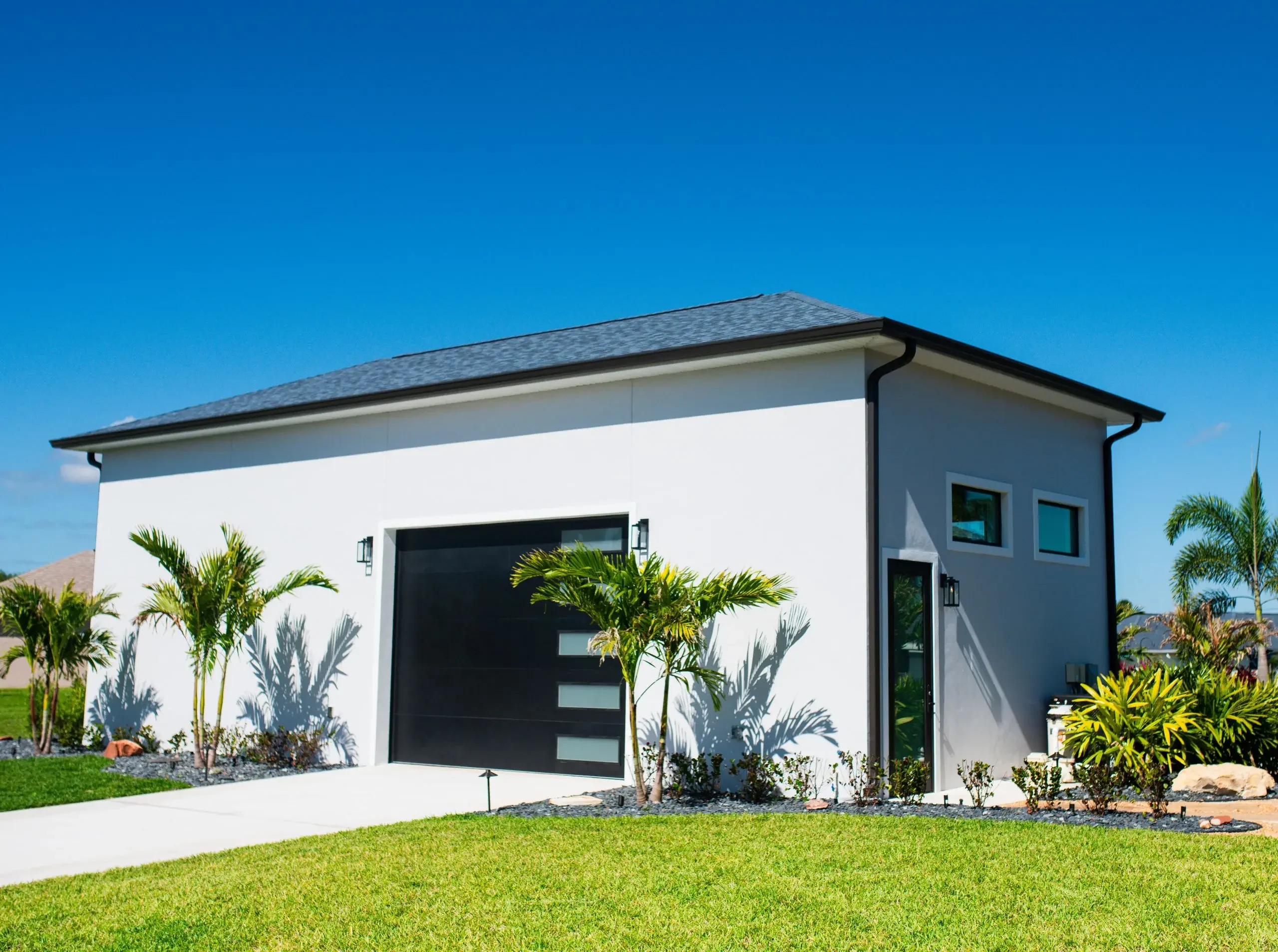 Pool house addition designed to complement the architecture of the main residence